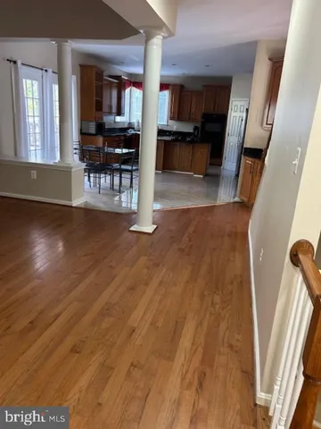a view of living room with furniture and window