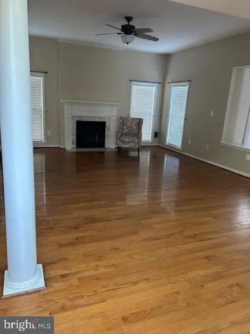 a view of a livingroom with wooden floor