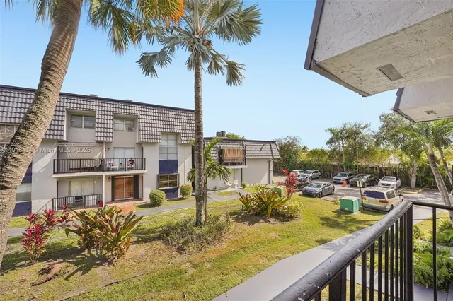 a view of a swimming pool with a chair