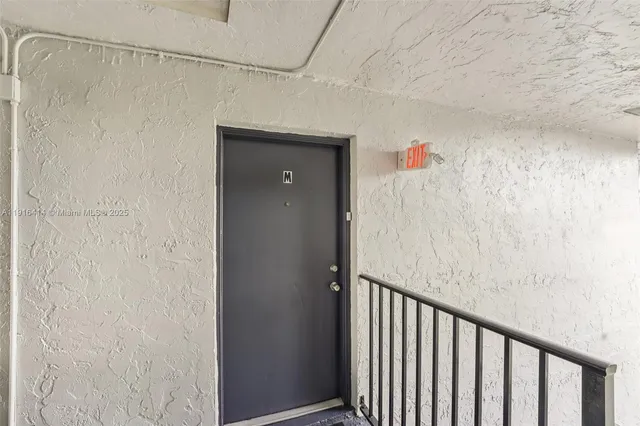 a bathroom with a shower and a shower curtain