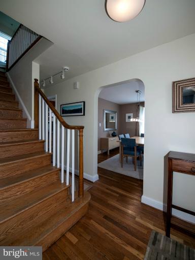 8813 Bradford Road Silver Spring, MD 20901 - Photo 18 of 23 a view of entryway and hall with wooden floor