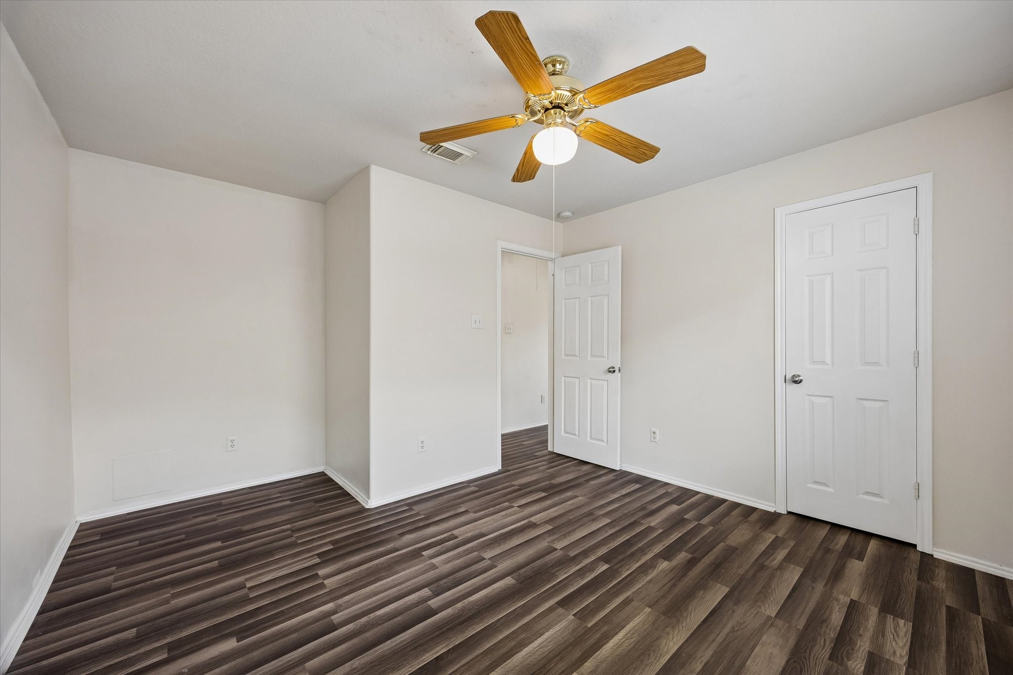 2614 Balsam Ridge Way Fresno, TX 77545 - Photo 11 of 14 a view of an empty room with wooden floor