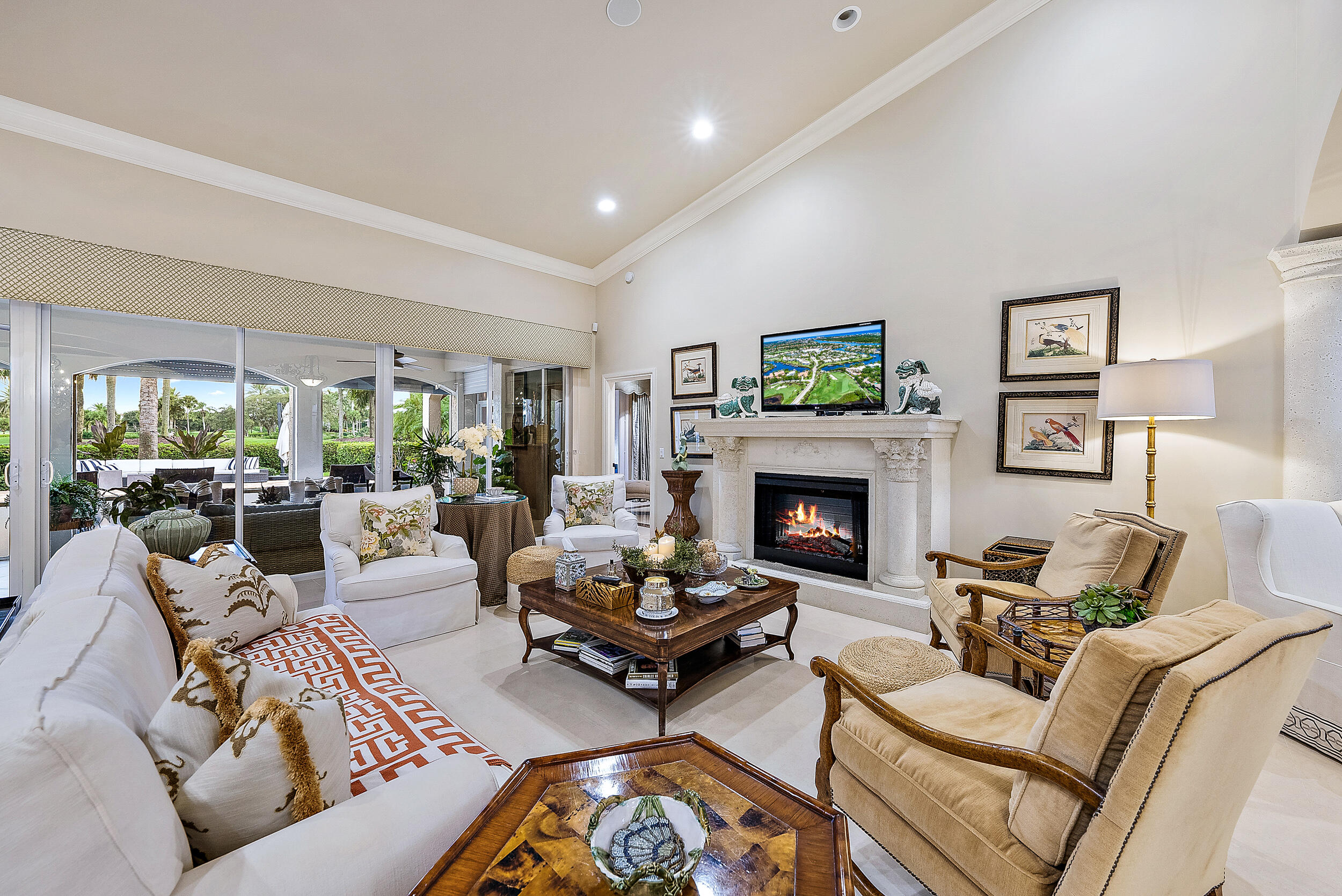 112 Regatta Drive Jupiter, FL 33477 - Photo 9 of 46 Living Room opens directly to rear porch