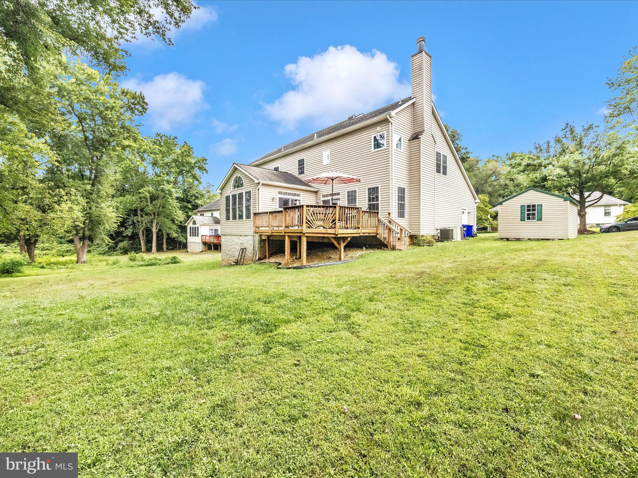 18818 Liberty Mill Road Germantown, MD 20874 - Photo 32 of 39 a view of a house with a yard