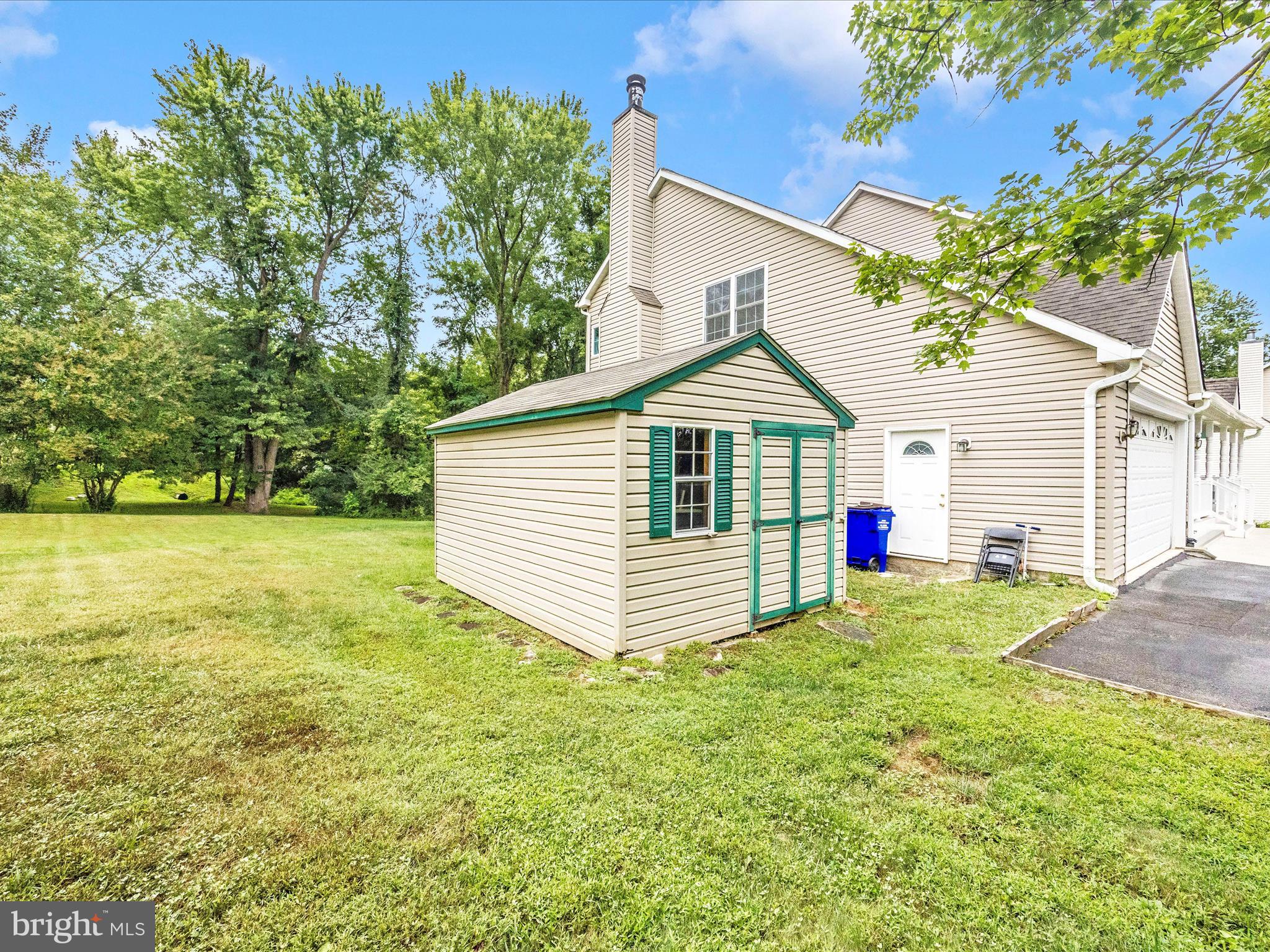 18818 Liberty Mill Road Germantown, MD 20874 - Photo 34 of 39 front view of a house with a yard