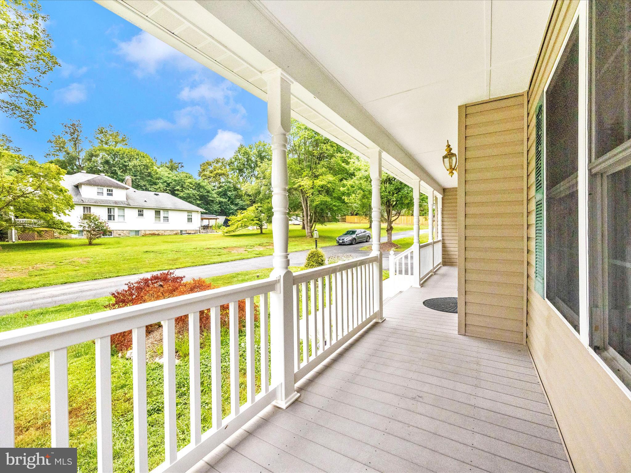 18818 Liberty Mill Road Germantown, MD 20874 - Photo 38 of 39 a view of a balcony with wooden floor