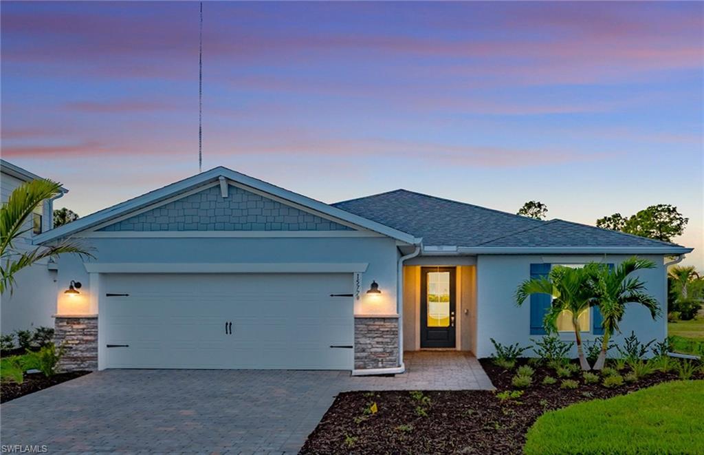 15779 Northridge Road Punta Gorda, FL 33982 - Photo 1 of 24 a front view of a house with garden