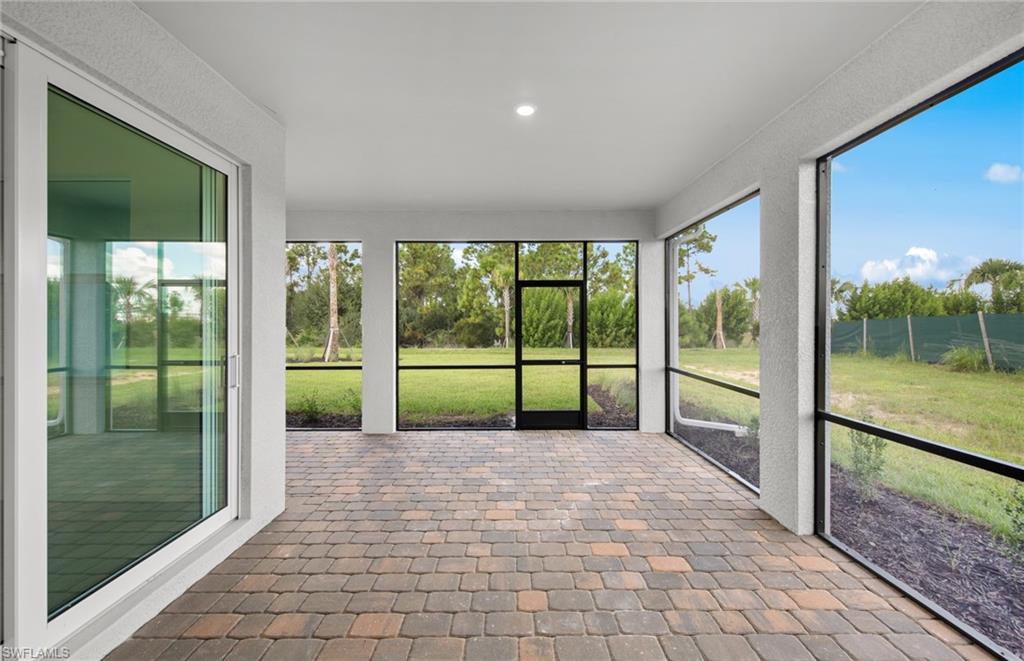 15779 Northridge Road Punta Gorda, FL 33982 - Photo 21 of 24 a view of a house with a swimming pool