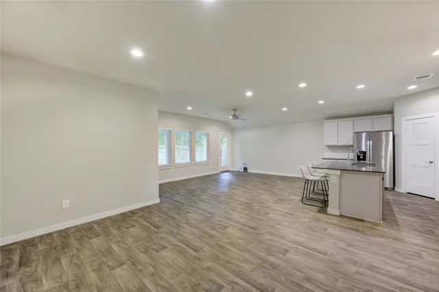 a view of kitchen with wooden floor