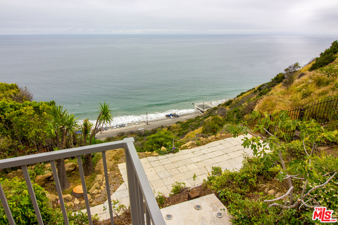 20534 Roca Chica Drive Malibu, CA 90265 - Photo 20 of 38 a view of ocean from a balcony