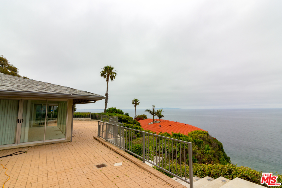 20534 Roca Chica Drive Malibu, CA 90265 - Photo 25 of 38 a view of a balcony with chairs