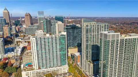 a view of a city with tall buildings