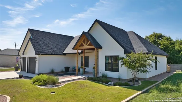a house view with a garden space