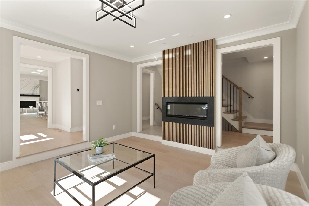 21 Richard Road Lexington, MA 02421 - Photo 15 of 34 a living room with furniture and a window