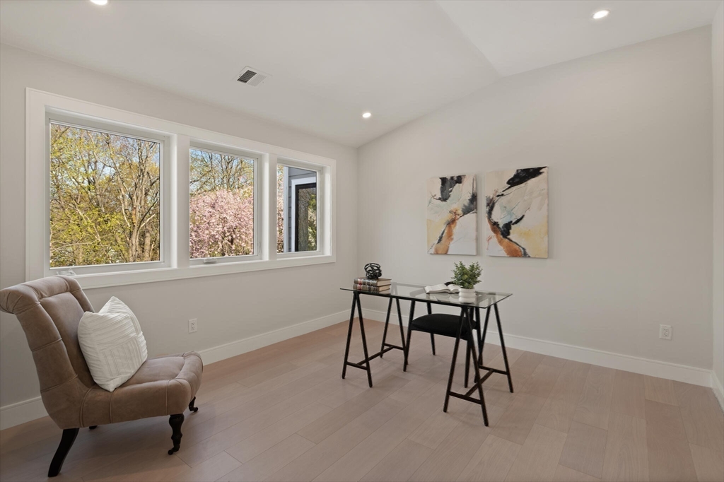 21 Richard Road Lexington, MA 02421 - Photo 17 of 34 a view of a workspace with furniture and a window