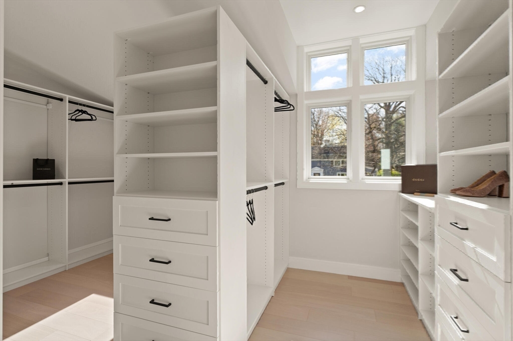 21 Richard Road Lexington, MA 02421 - Photo 23 of 34 a view of walk in closet and bedroom view