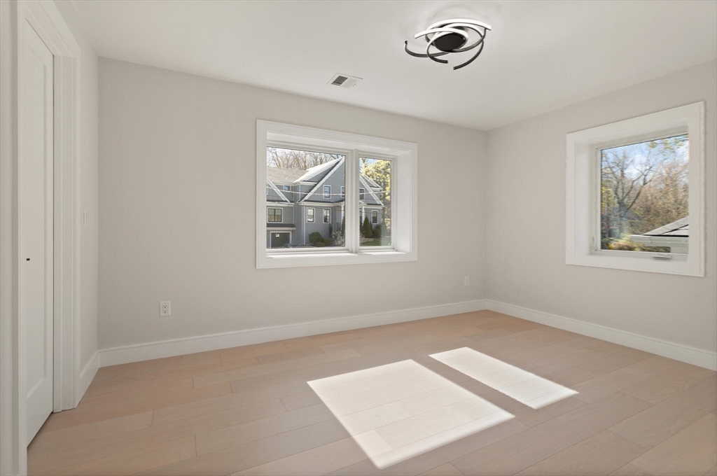 21 Richard Road Lexington, MA 02421 - Photo 24 of 34 a view of an empty room with a window