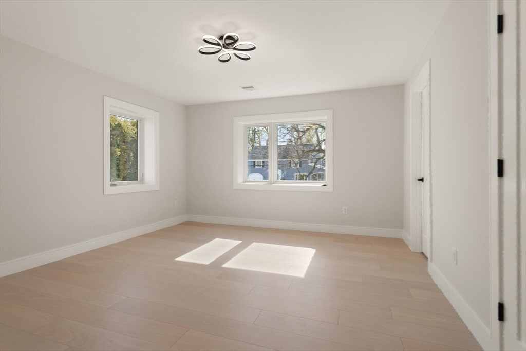 21 Richard Road Lexington, MA 02421 - Photo 27 of 34 a view of an empty room with a window