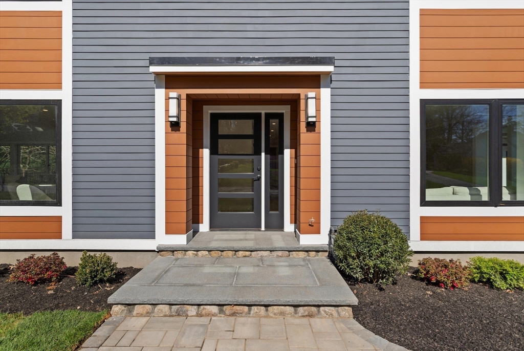 21 Richard Road Lexington, MA 02421 - Photo 3 of 34 a front view of a house with a yard