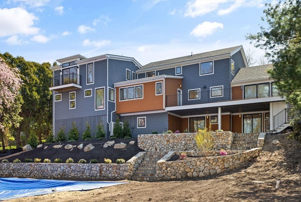 21 Richard Road Lexington, MA 02421 - Photo 4 of 34 a front view of a house with a yard