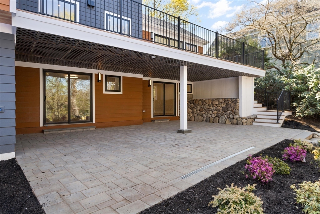 21 Richard Road Lexington, MA 02421 - Photo 5 of 34 a view of a house with a garage