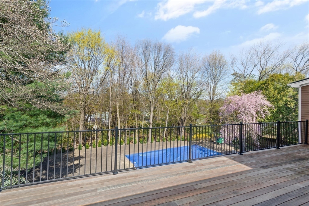 21 Richard Road Lexington, MA 02421 - Photo 7 of 34 a view of a house with a fence