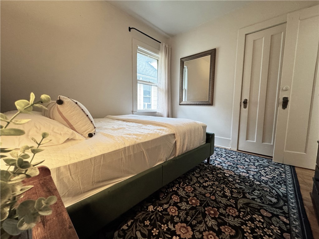 118 Gregory Street, Unit 3 Rochester, NY 14620 - Photo 24 of 41 1sr bedroom with queen bed and large closet.