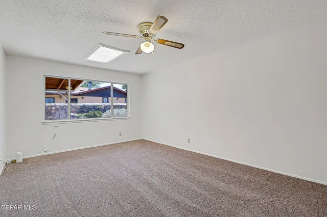 a kitchen with stainless steel appliances granite countertop a stove and a microwave
