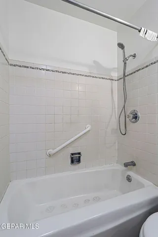 an aerial view of a house with yard swimming pool and outdoor seating