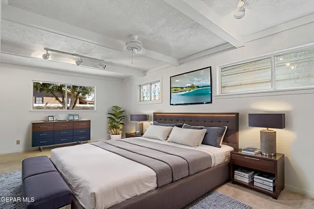 an aerial view of red and white house