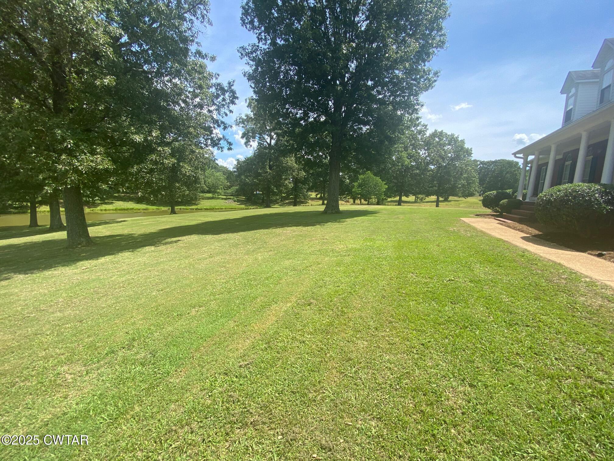 465 Garland Road Henderson, TN 38340 - Photo 11 of 31 a view of an outdoor space and swimming pool