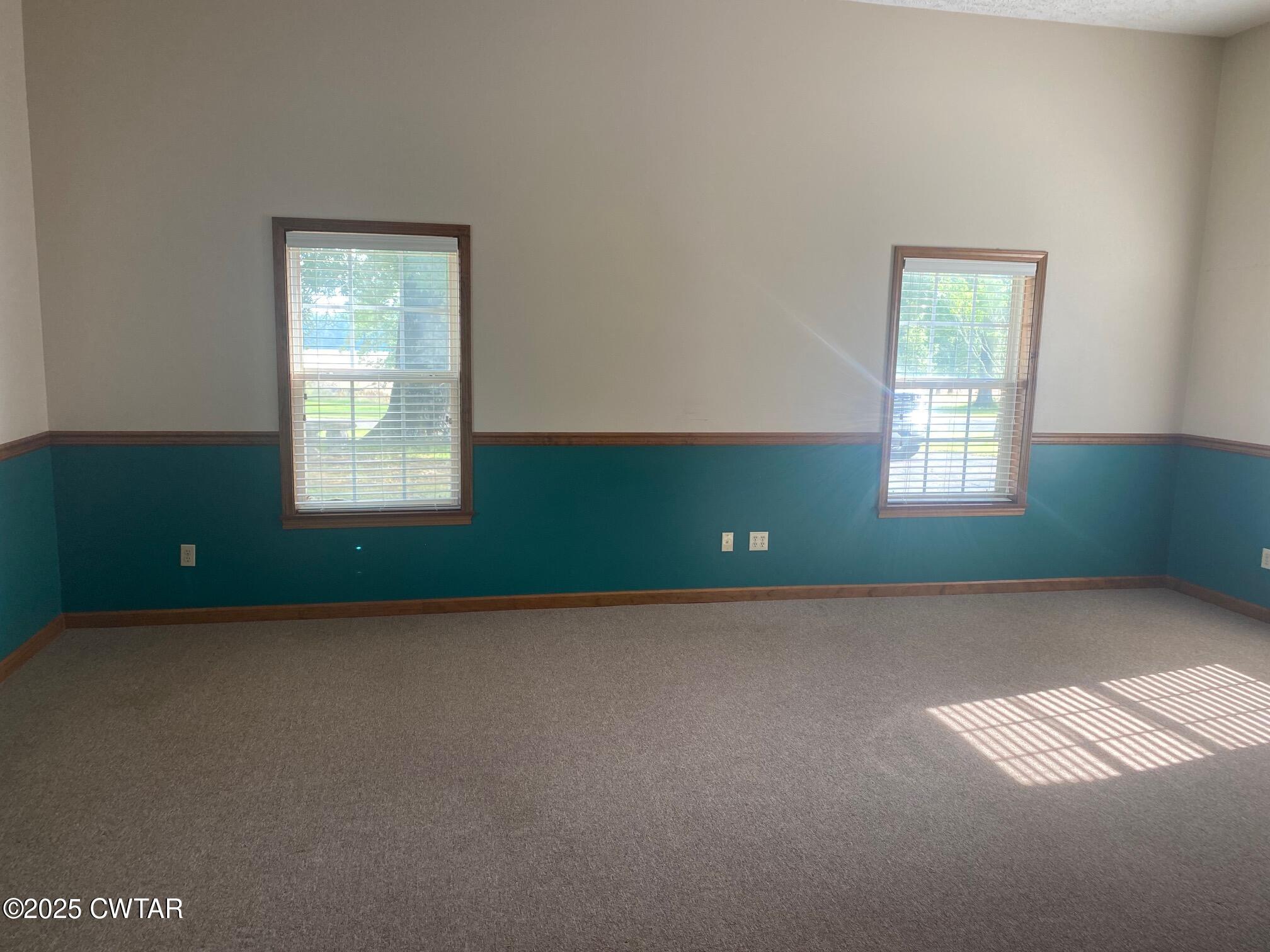 465 Garland Road Henderson, TN 38340 - Photo 19 of 31 an empty room with windows