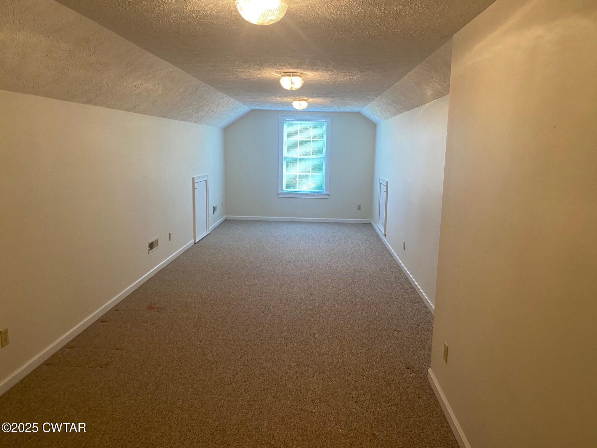 465 Garland Road Henderson, TN 38340 - Photo 21 of 31 a view of an empty room and window