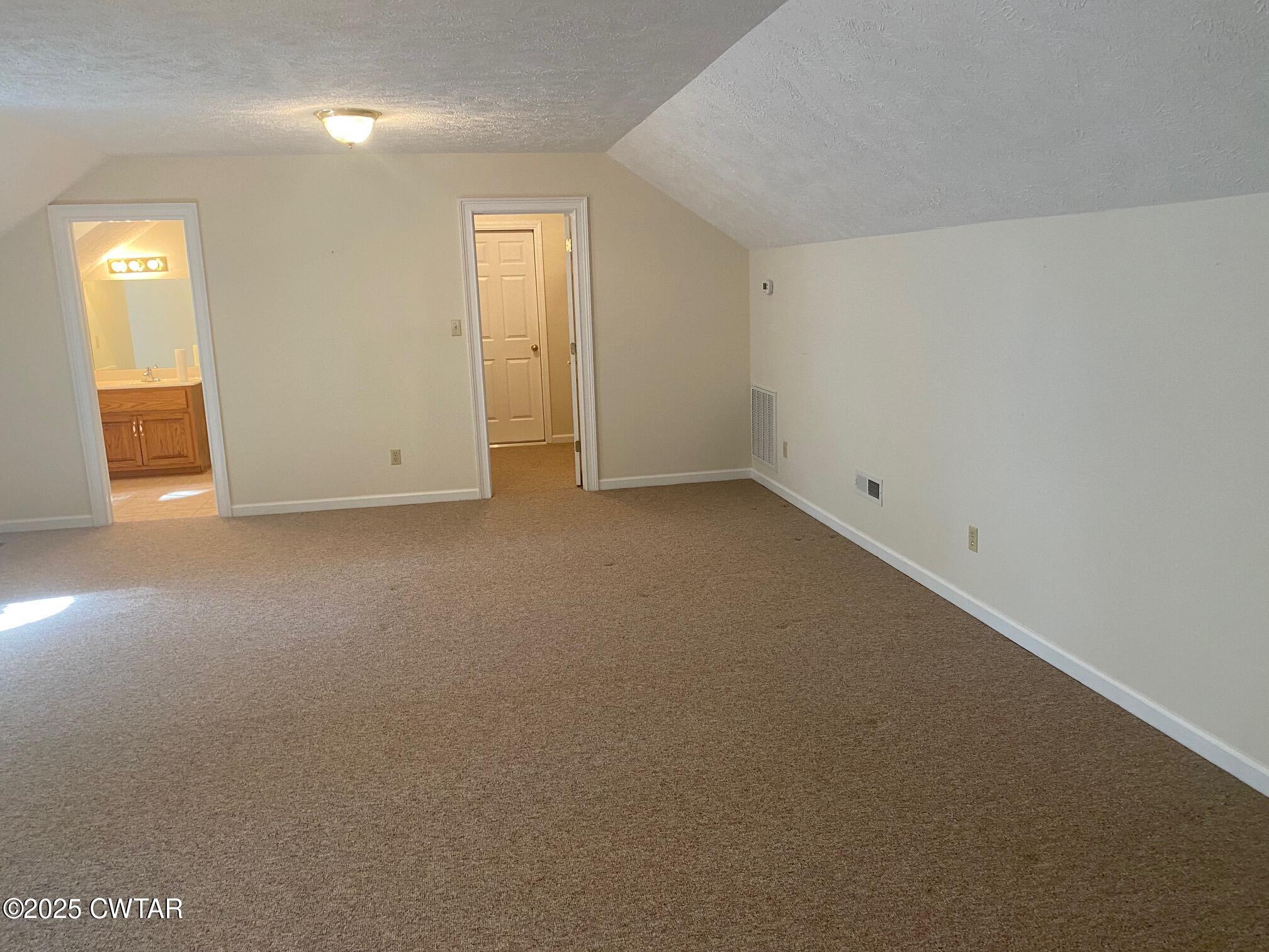 465 Garland Road Henderson, TN 38340 - Photo 22 of 31 a view of an empty room with a closet