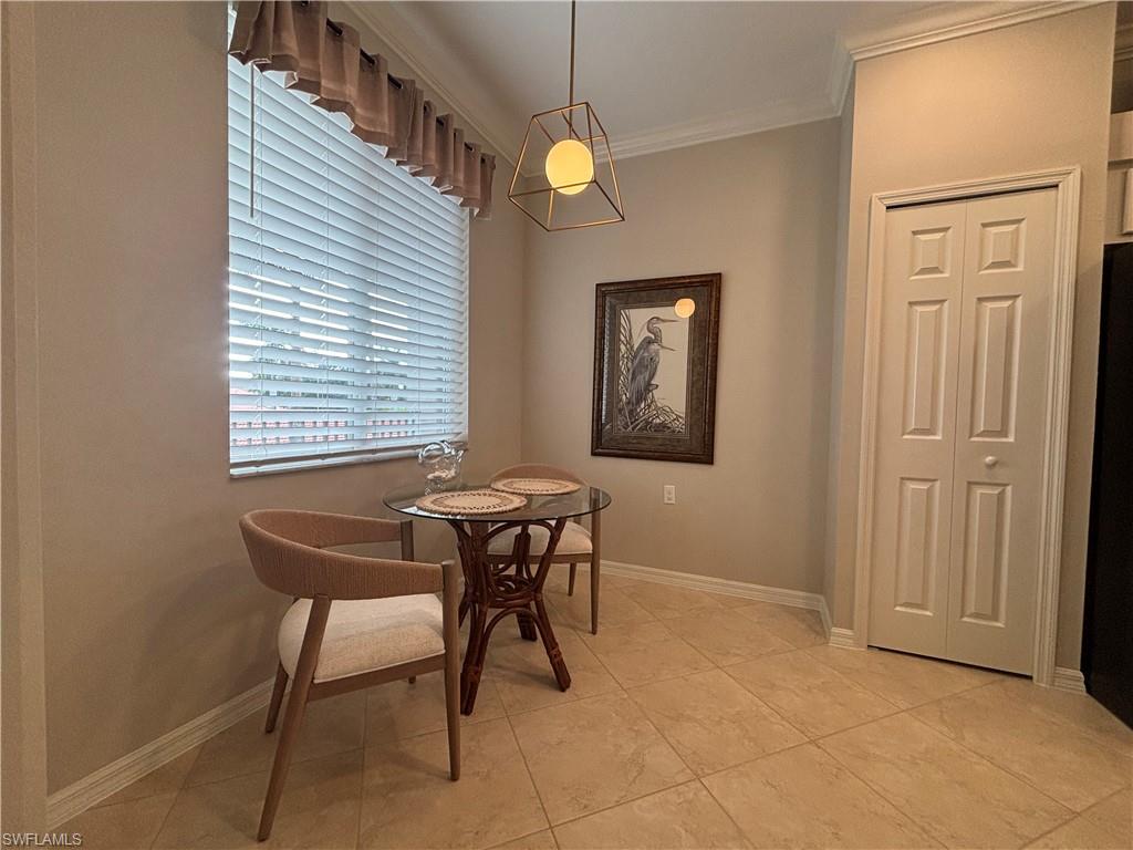 10341 Heritage Bay Boulevard, Unit 1924 Naples, FL 34120 - Photo 14 of 36 a workspace room with furniture and window