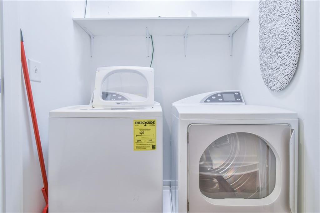 1225 Carter Road Decatur, GA 30030 - Photo 6 of 20 a utility room with dryer and washer