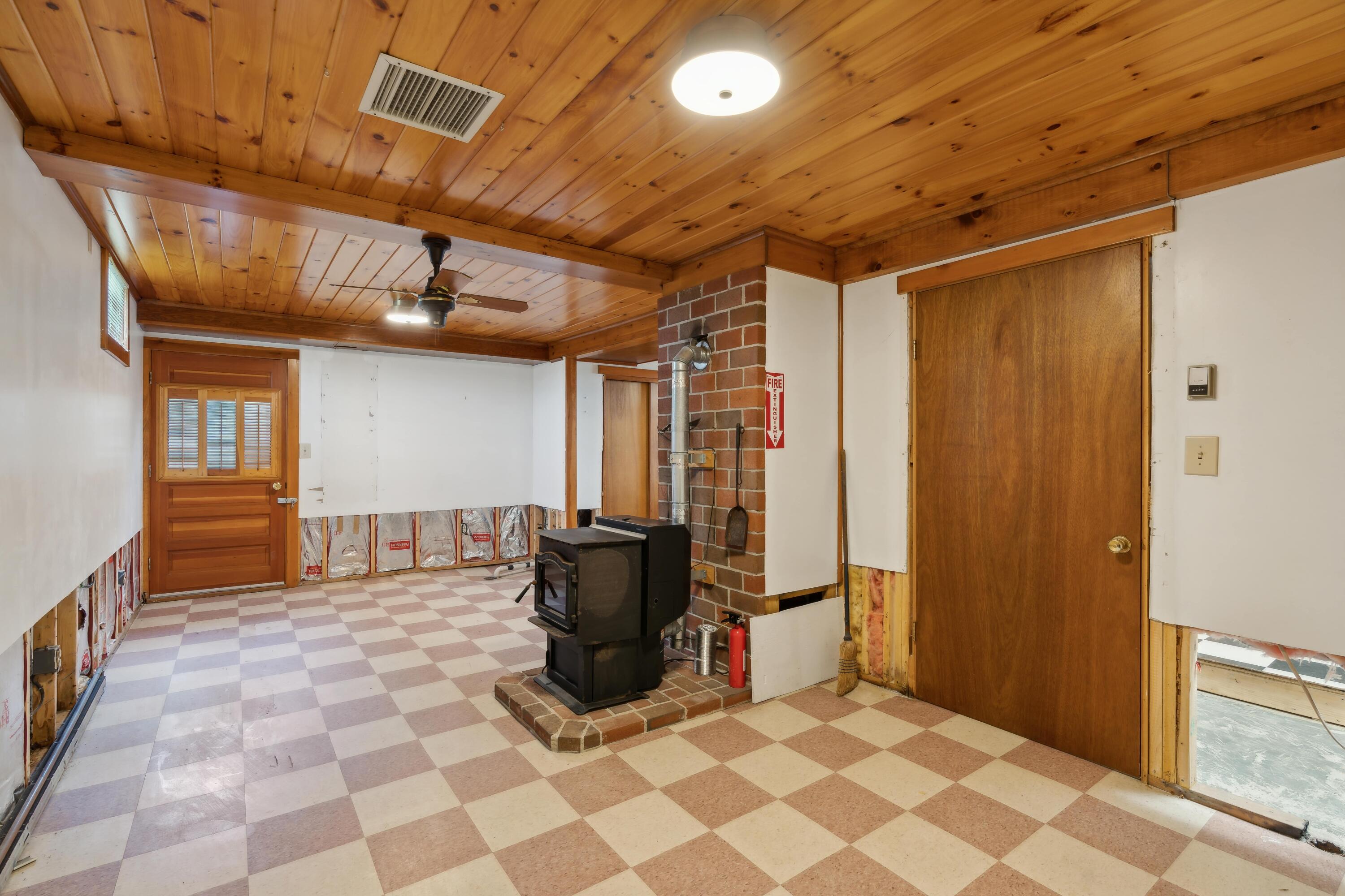 55 West Meadow Road Thomaston, ME 04861 - Photo 24 of 27 bonus room with pellet stove