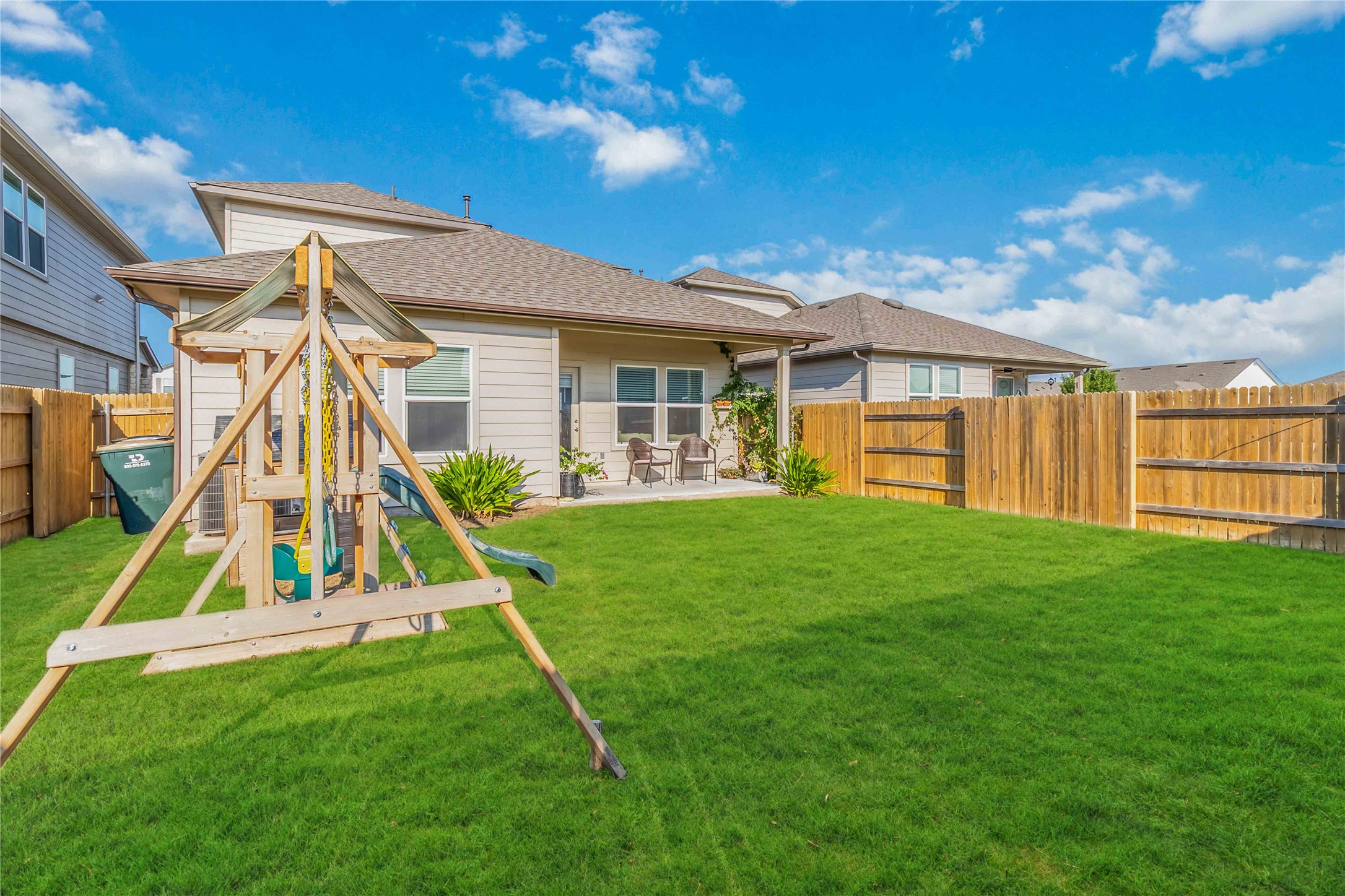 103 Mariners Landing Bastrop, TX 78602 - Photo 22 of 25 a view of a house with a backyard