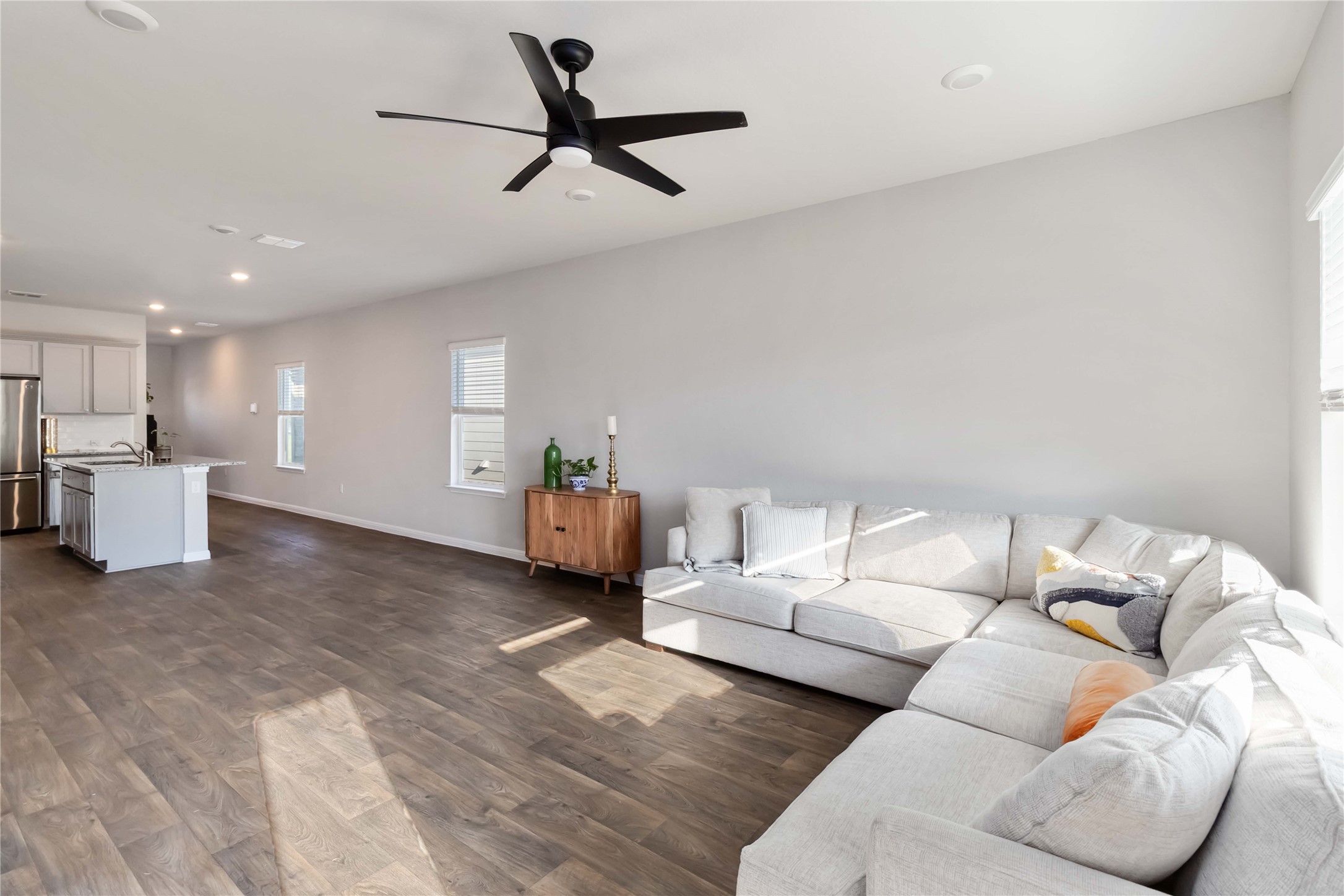 103 Mariners Landing Bastrop, TX 78602 - Photo 7 of 25 a living room with furniture and kitchen view