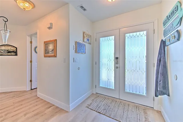 a room with furniture and baby crib