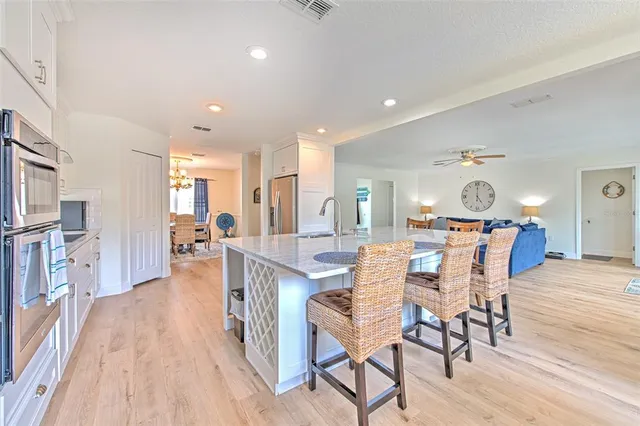 an aerial view of a city with ocean view