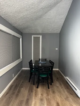a view of a workspace with furniture