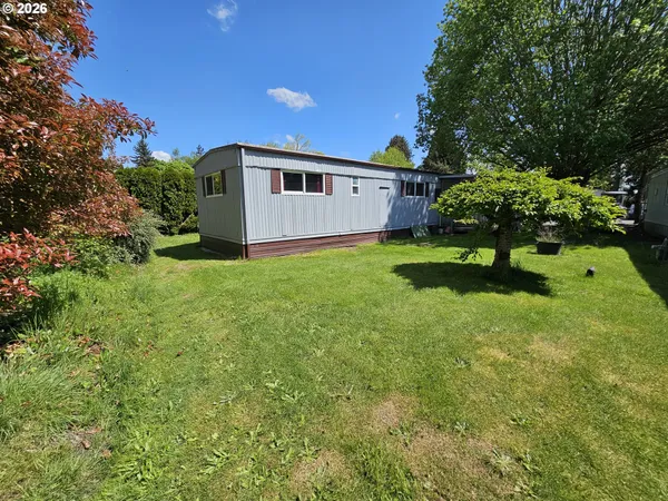 a house view with a garden space