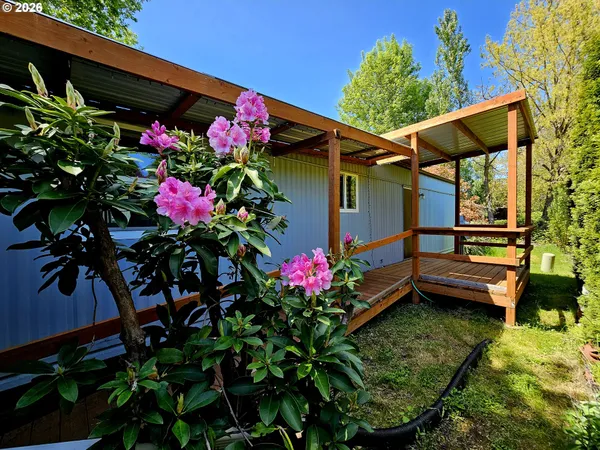 a house view with a garden space