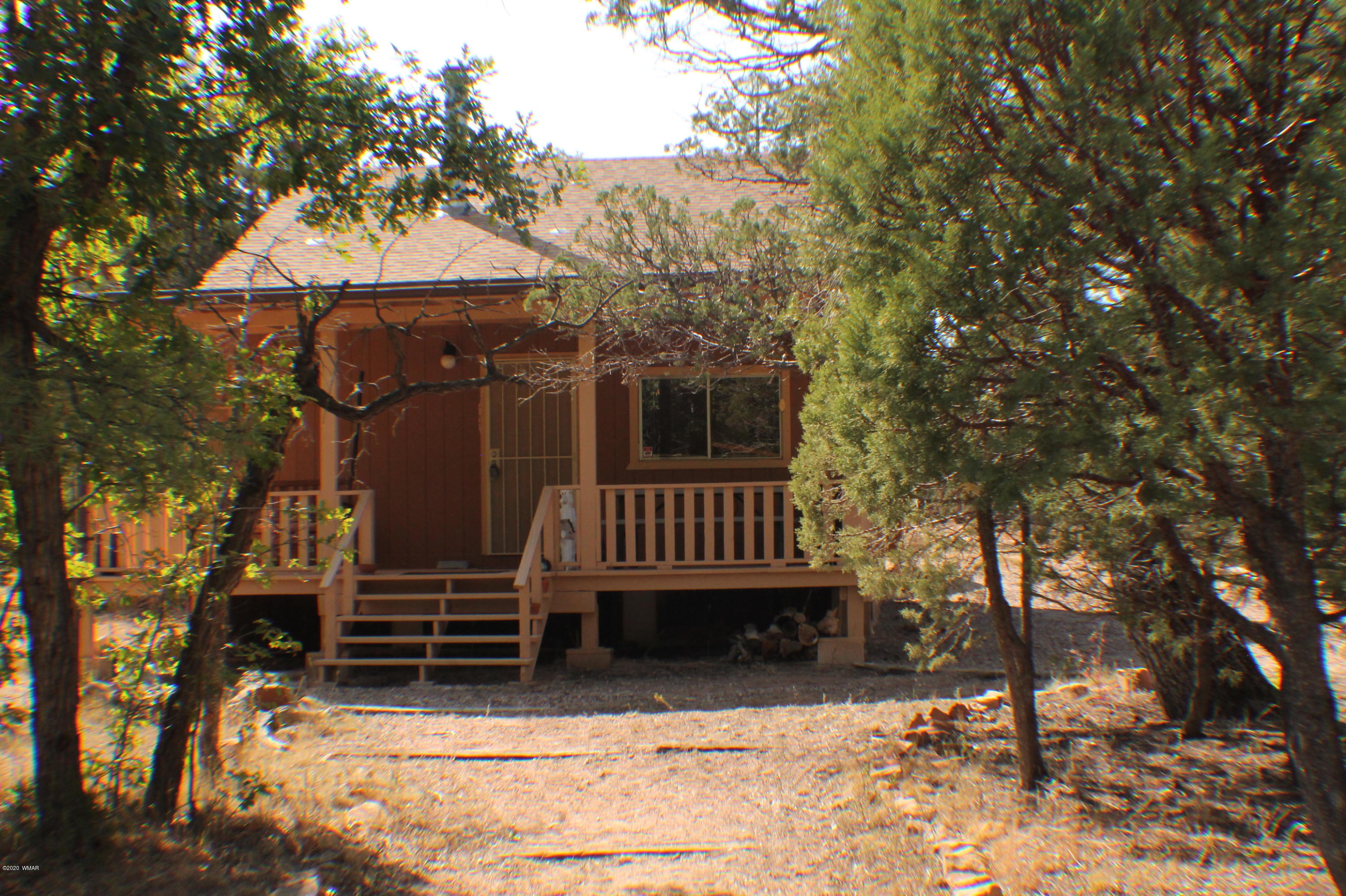2048 Gilbert Lane Overgaard, AZ 85933 - Photo 3 of 41 a view of house with a yard