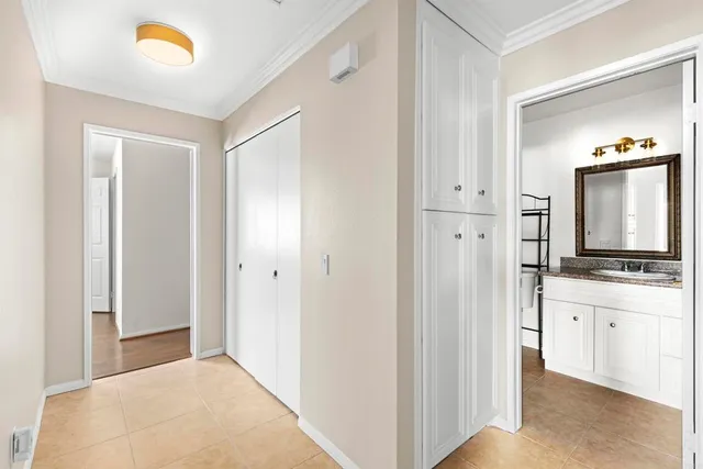 a view of a kitchen from the hallway