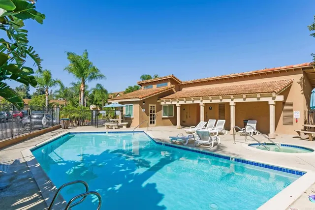 a view of a house with backyard porch and patio