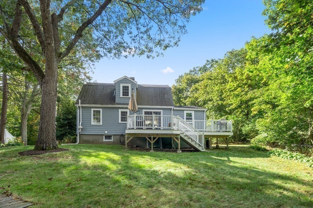 119 Sylvan Road Needham, MA 02492 - Photo 21 of 23 front view of a house with a big yard