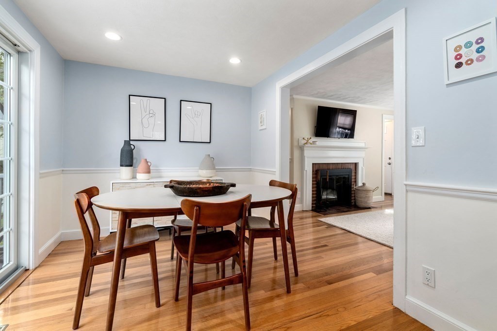 119 Sylvan Road Needham, MA 02492 - Photo 6 of 23 a view of a dining room with furniture and wooden floor