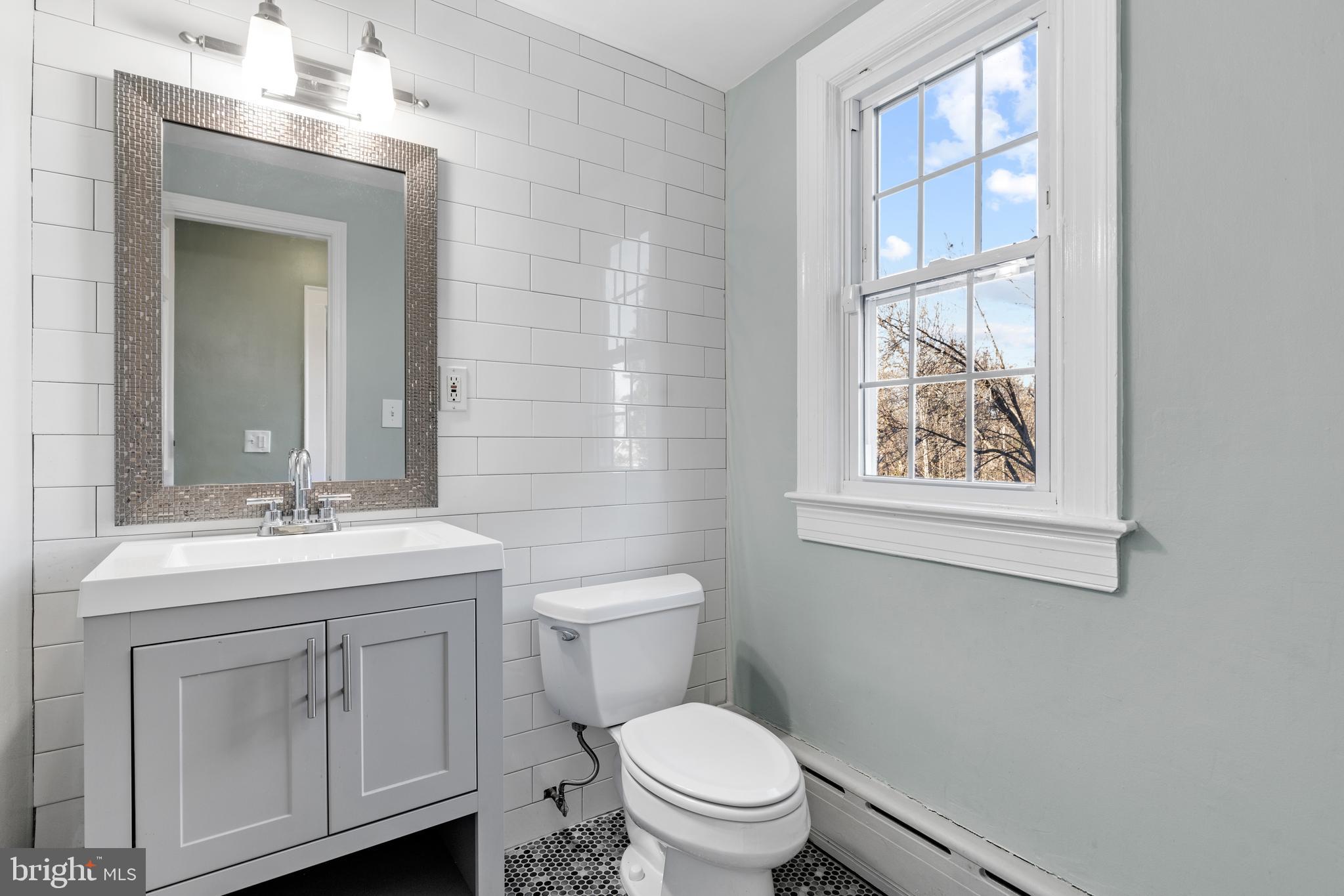 11119 Midvale Road Kensington, MD 20895 - Photo 14 of 37 Renovated half bath on main level